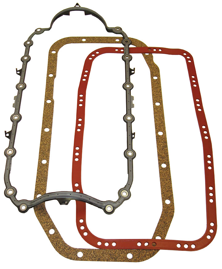 Oil pan outlet gaskets